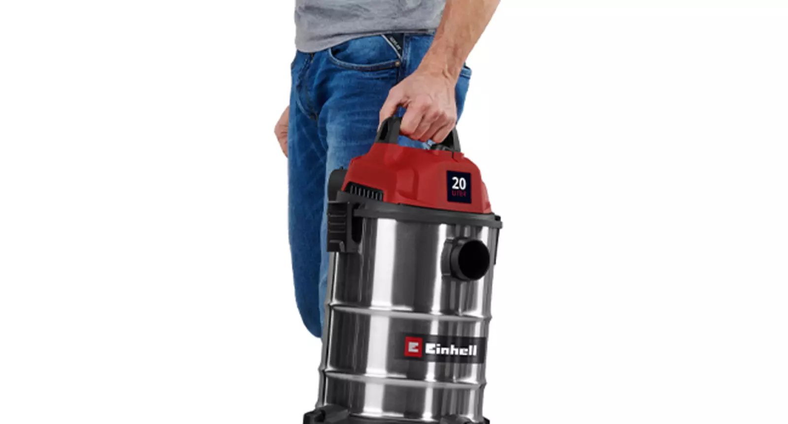 Человек переносит пылесос Einhell TC-VC 2045 S за верхнюю ручку.