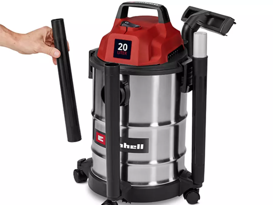 Держатель для аксессуаров на пылесосе Einhell TC-VC 2045 S со вставленной трубкой сбоку корпуса.