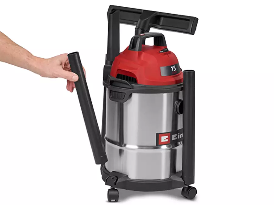 Пилосос для вологого та сухого прибирання Einhell TC-VC 1540 S з тримачем для труб та насадок на задній панелі.