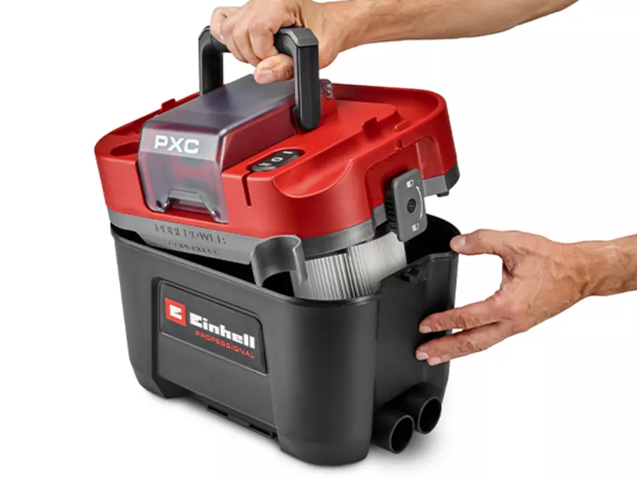 Пилосос Einhell TP-VC 18/10 Li BL L-Solo відкривається за допомогою бічних поворотних замків, видно контейнер для пилу.