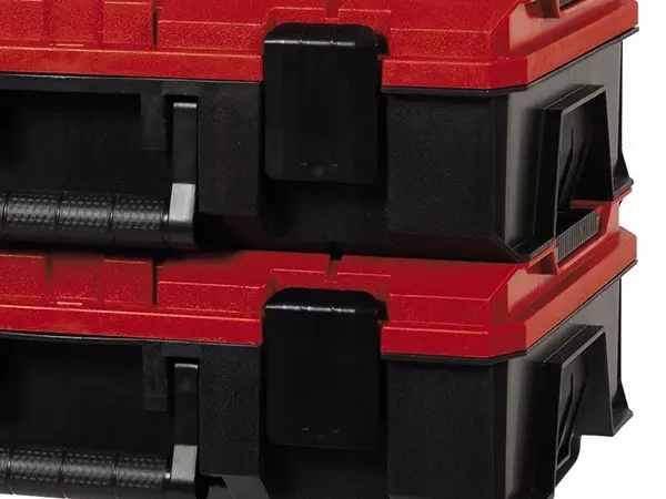 Два міцні пластикові замки фіксують системний кейс Einhell E-Case S-F.